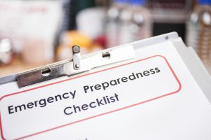 Image of a clip board with an emergency preparedness checklist