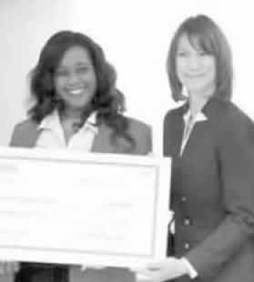 Leslie Keen of Peoples Health presenting check to Marcia Nelson of PYHO.
