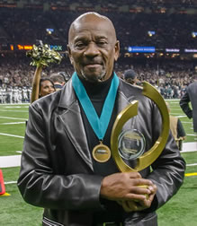 Peoples Health Honors Champion Dr. Johnnie W. Jones Jr. at Saints Home Game