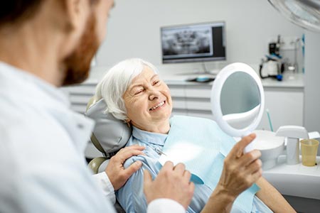 Dina Dental logo
