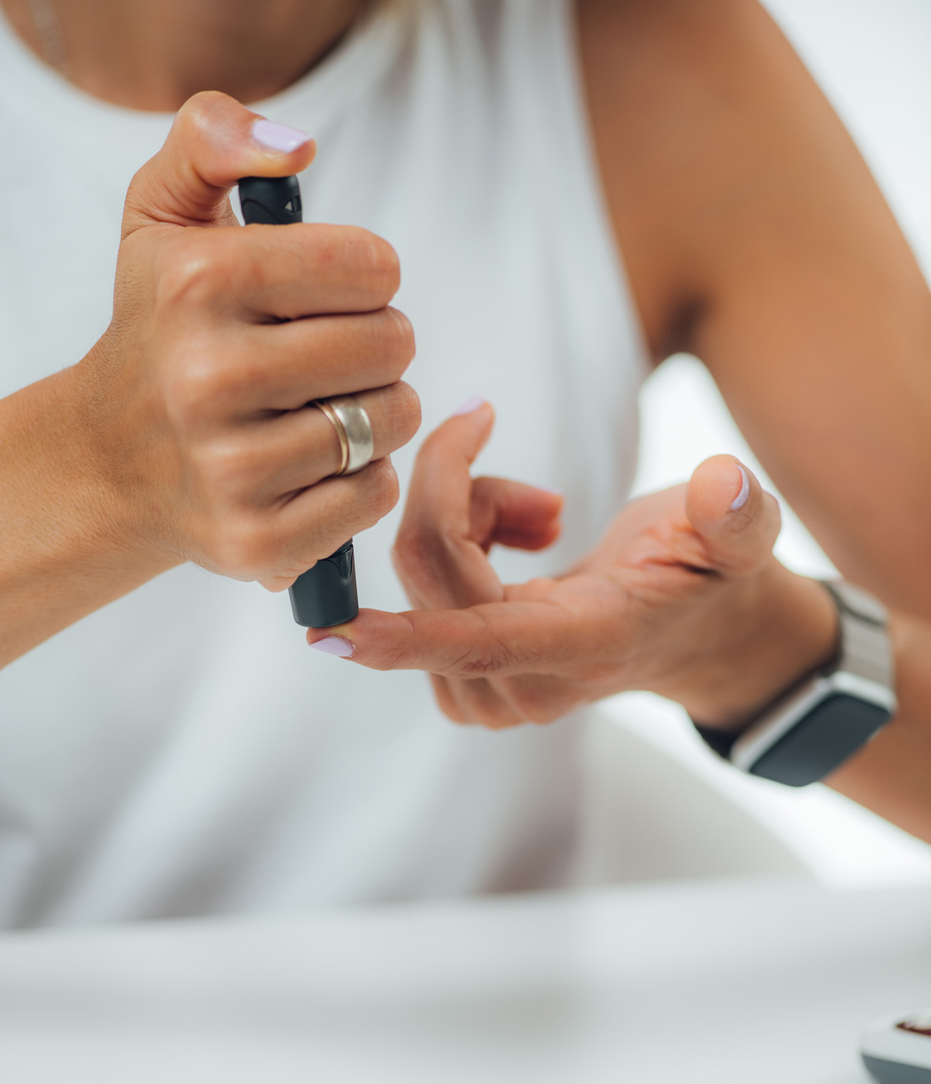 Woman checking A1C levels.